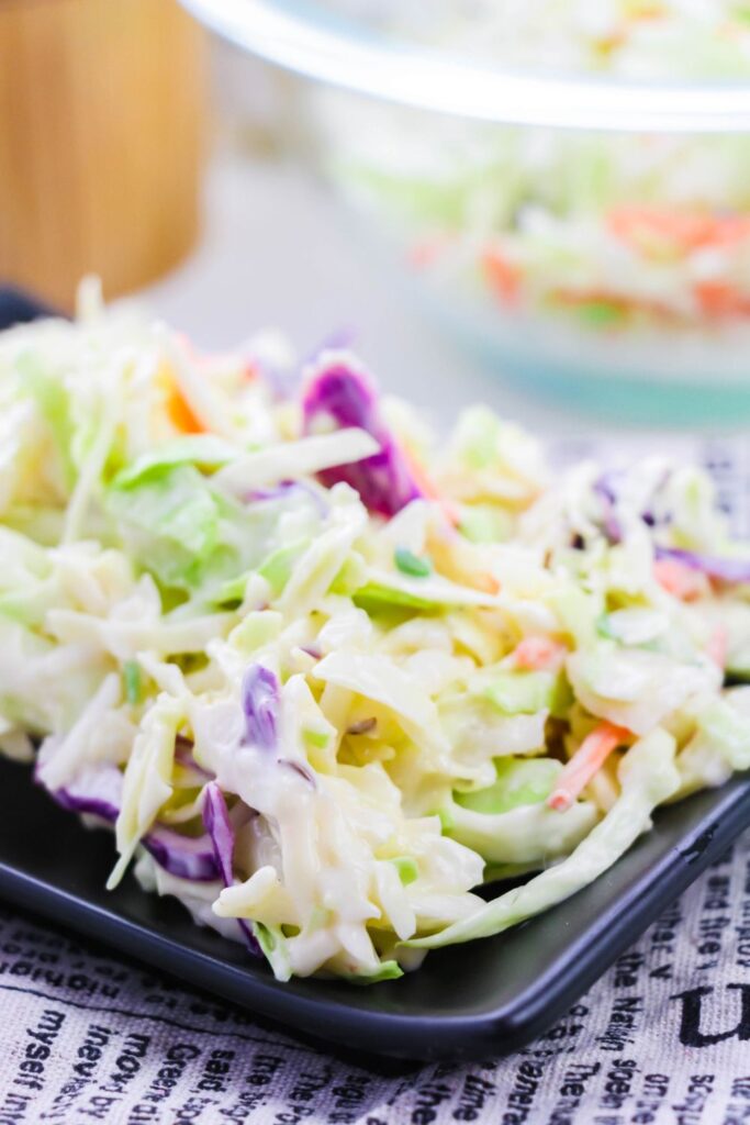 plate with coleslaw on it 