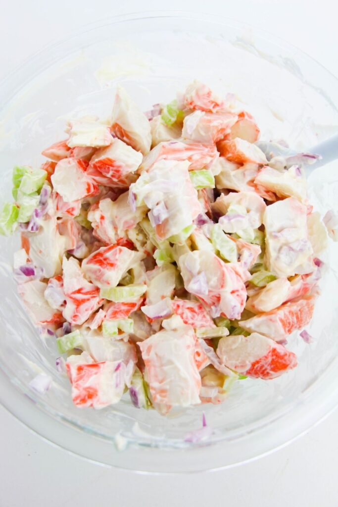 imitation crab salad in a bowl on table 