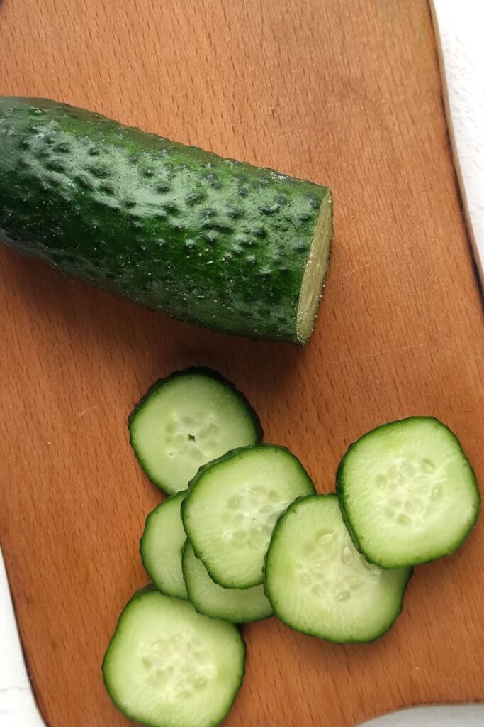 cucumber on cutting board 