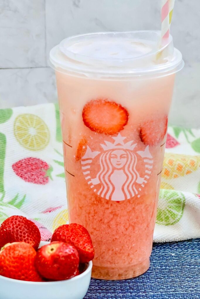 close up of strawberry drink on table 