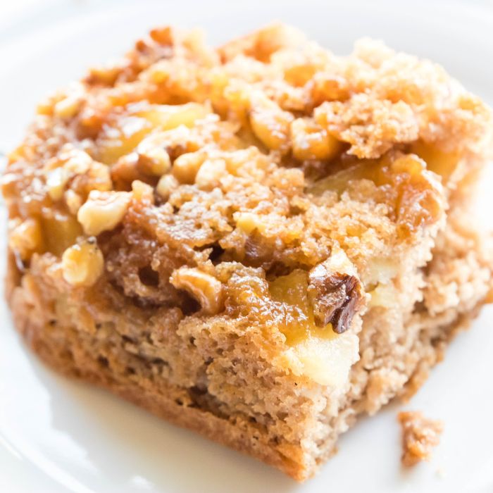 slice of apple upside down cake on white plate 