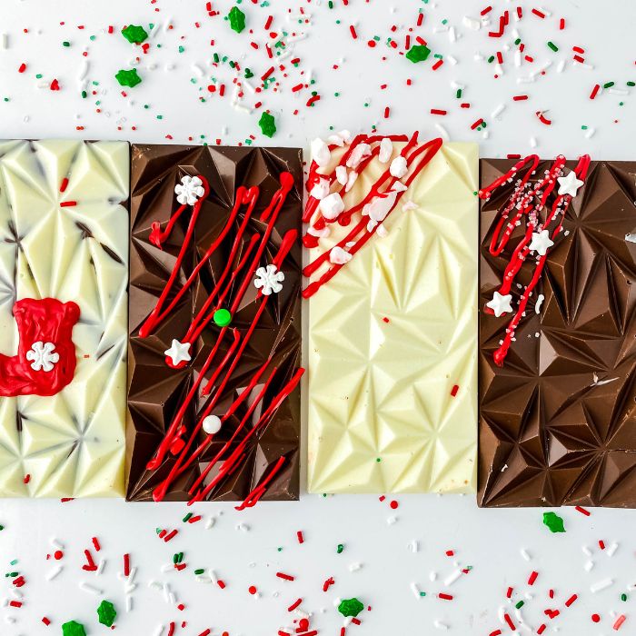 chocolate bar christmas on table with sprinkles around it 