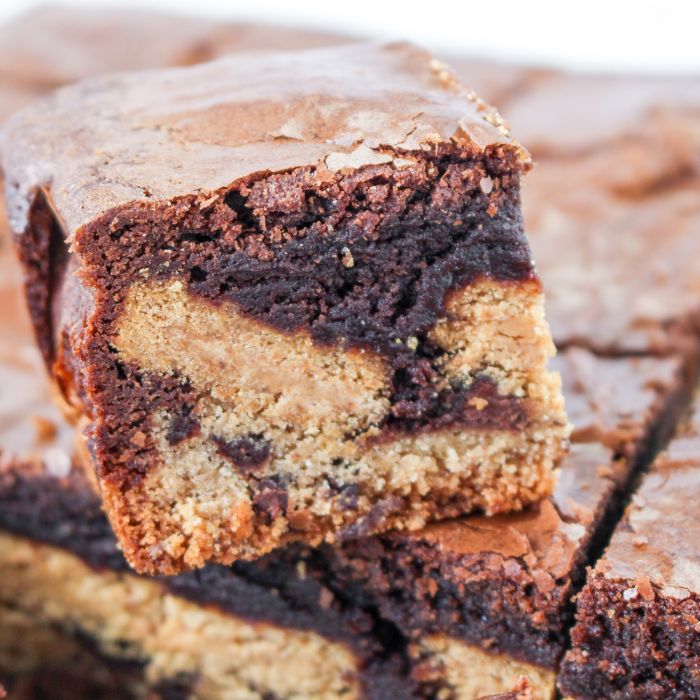 layered brownie bar on top of other brownies