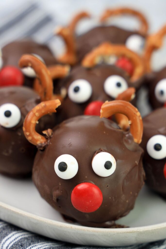 close up of reindeer designed no bake balls on plate