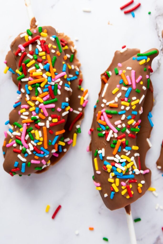 chocolate banana pops on marble counter