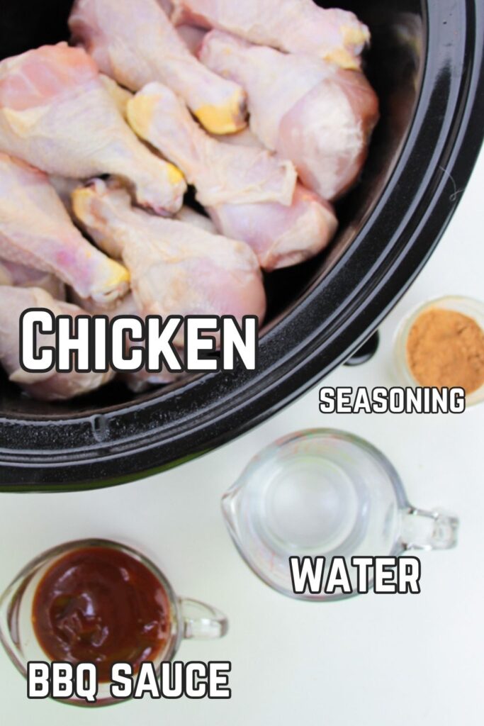 chicken legs in crockpot with bowls of seasoning, sauce and water around it on table 