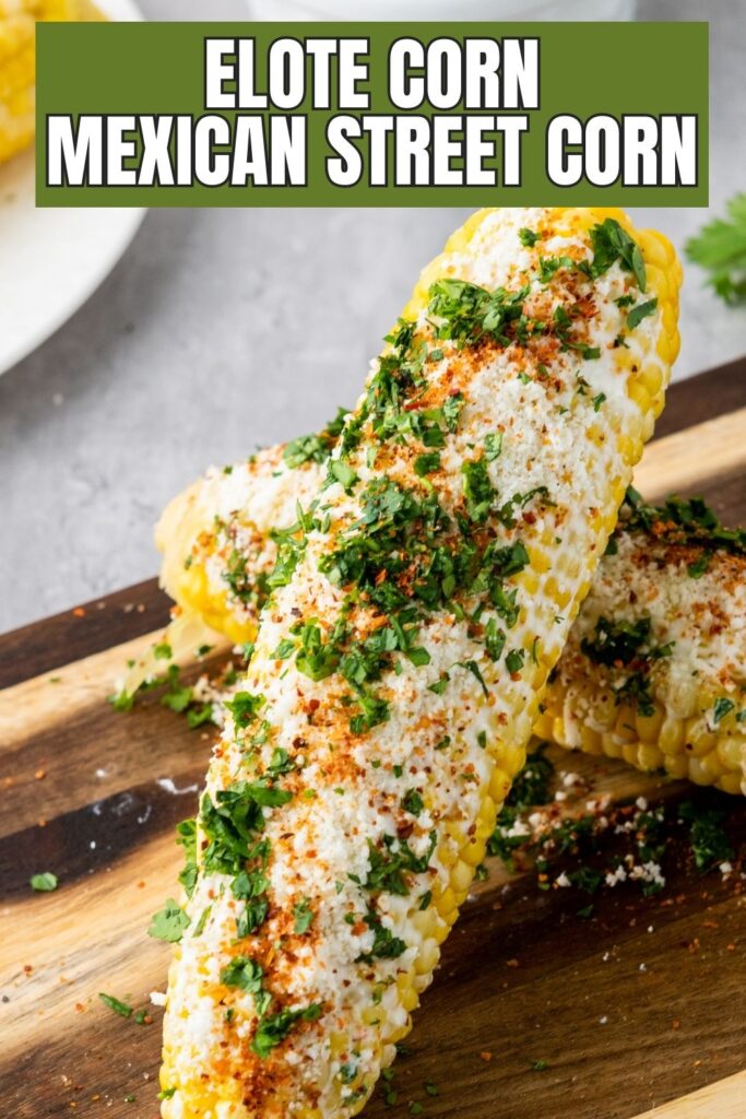 elote corn on wooden cutting board 