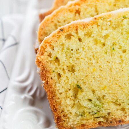 sliced lemon zucchini bread on a platter