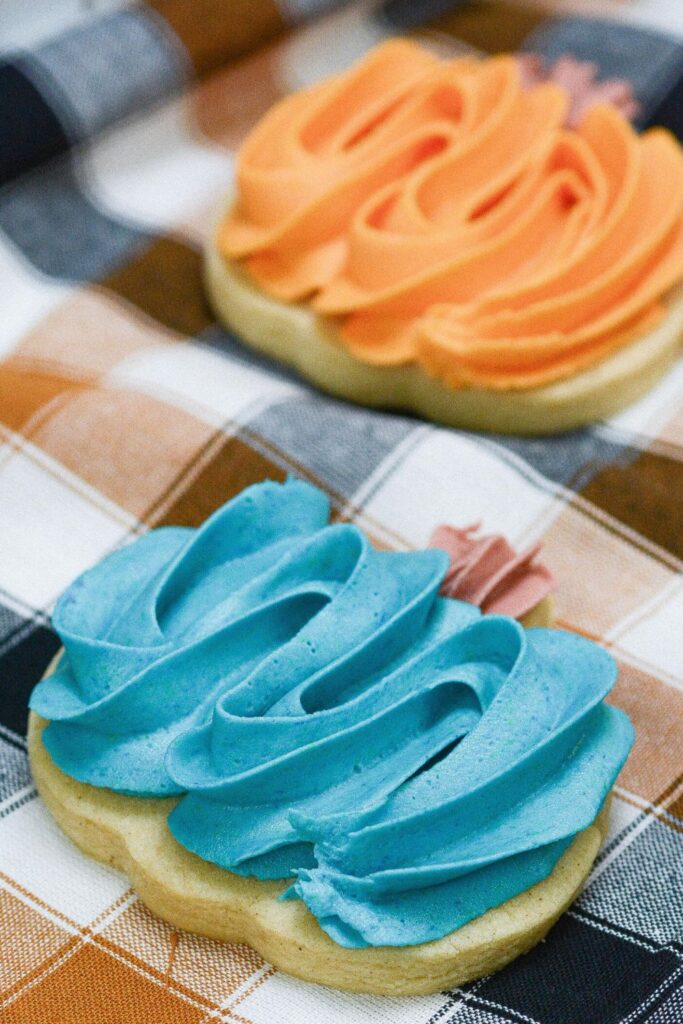 pumpkin cookies on a table 