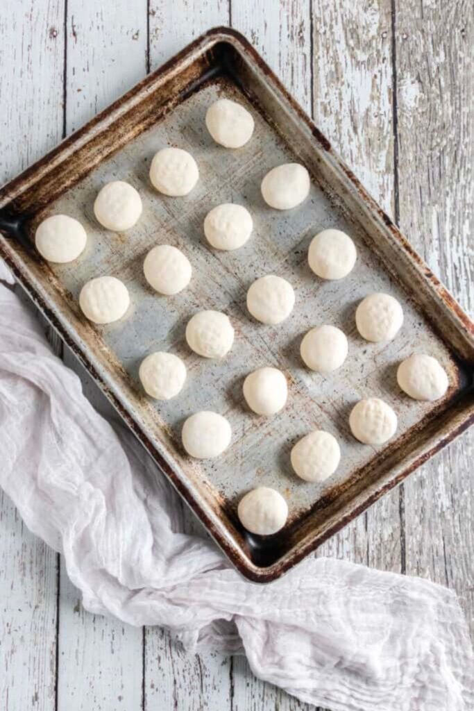 frozen dough balls of bread dough on table 