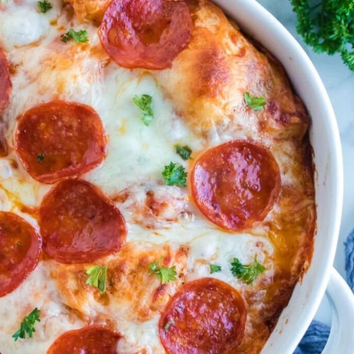 Bubble Pizza in a white casserole pan sitting on table 