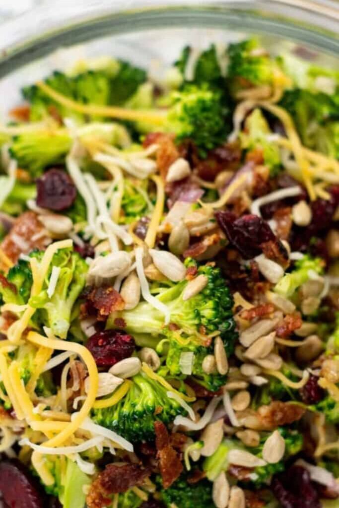close up view of broccoli salad in a bowl 