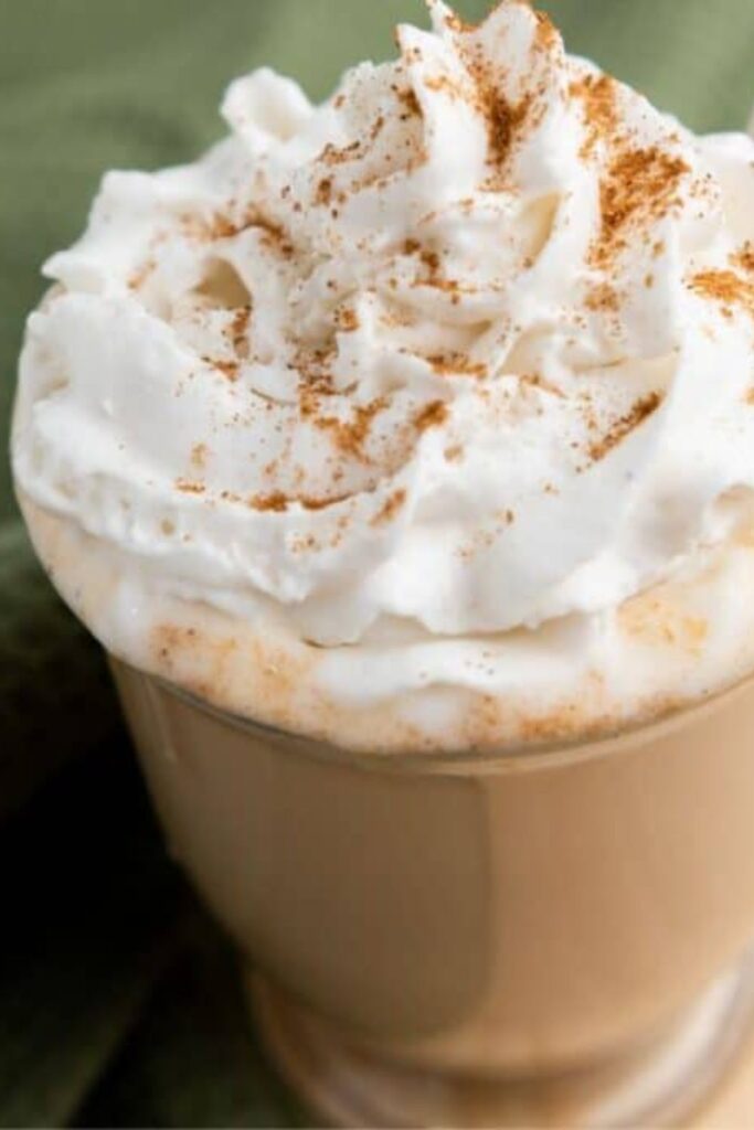 closeup of latte with cinnamon on top
