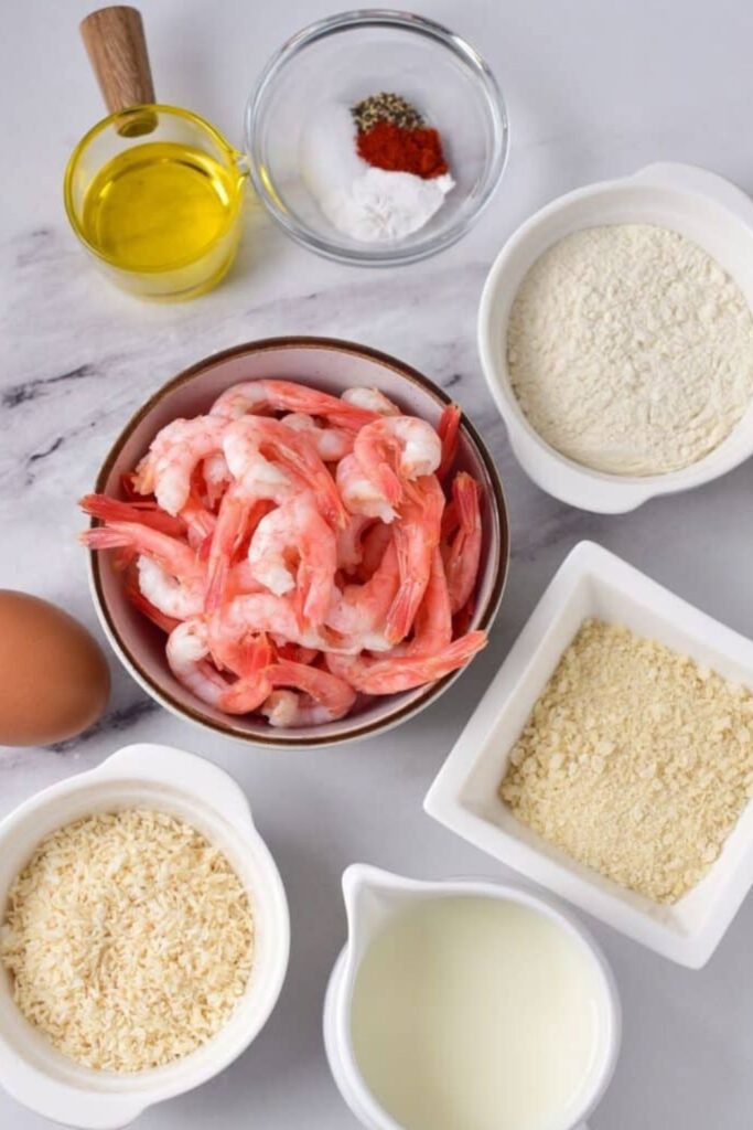 ingredients for Fried Coconut Shrimp sitting on the counter