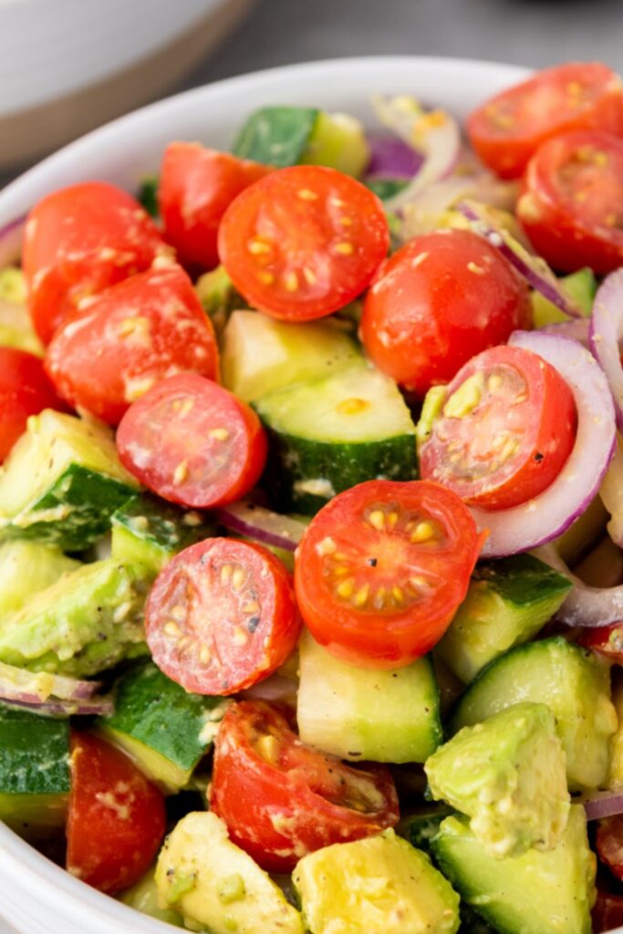bowl with tomatoes, cucumbers and onions