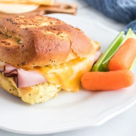 Air Fryer Ham and Cheese on a plate with celery and carrots to side of plate