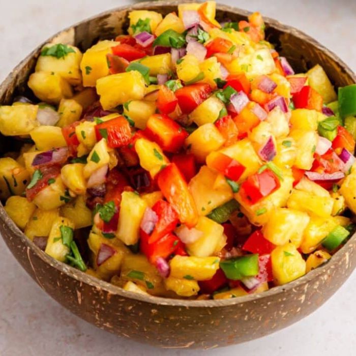 Pineapple Jalapeno Salsa in a wooden bowl on table