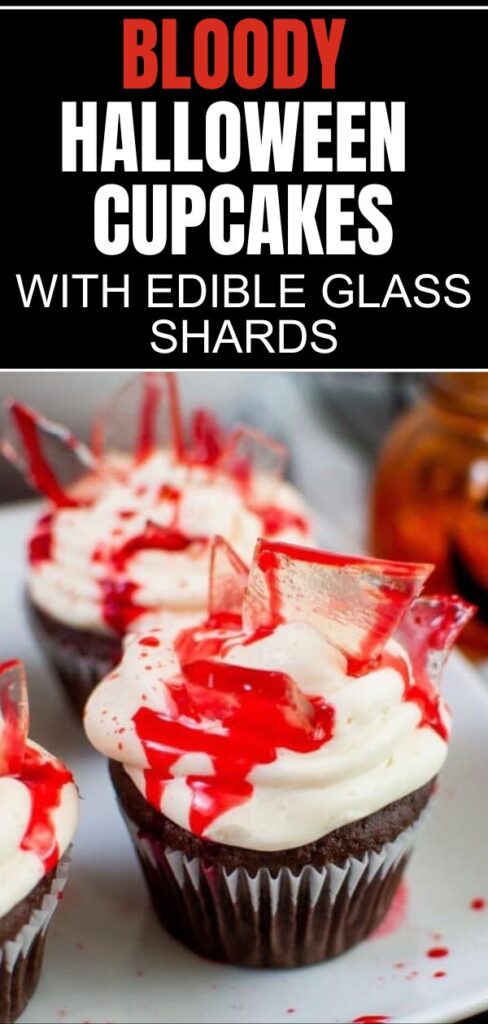 Bloody Cupcakes on a white plate with a glass pumpkin to the side
