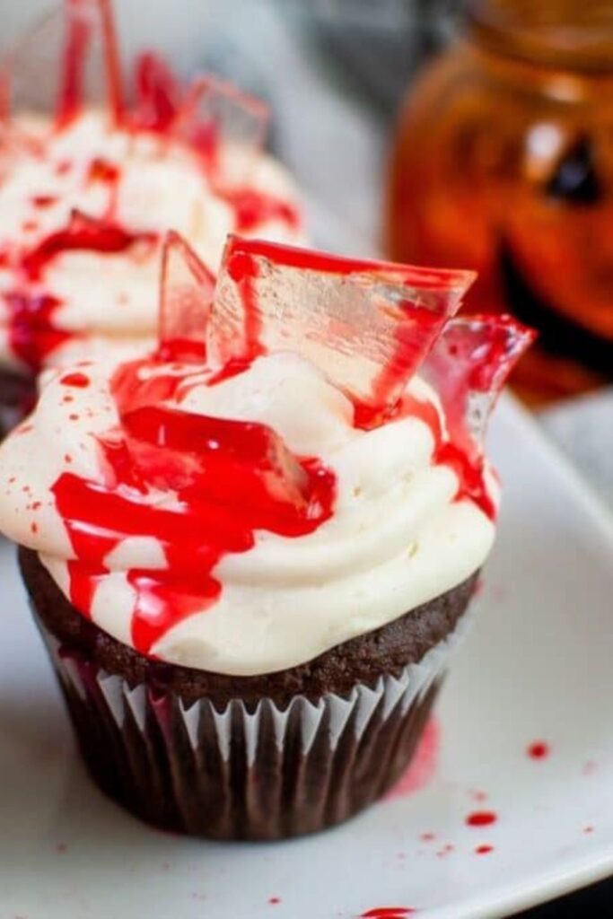 Bloody Cupcakes for Halloween on a white tray on table