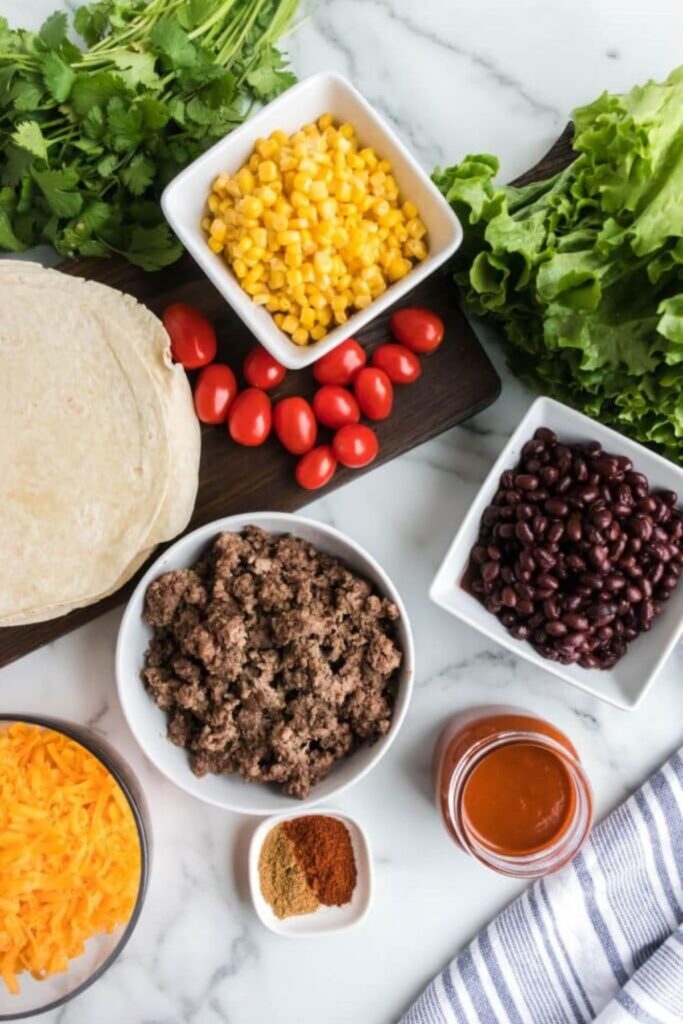 all the ingredients for layered enchilada casserole