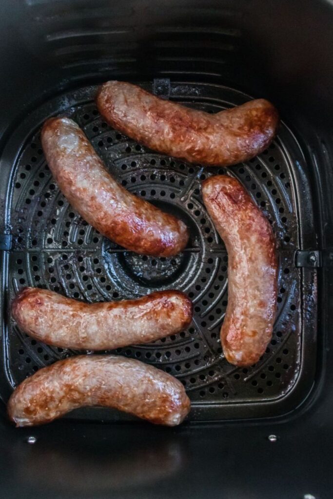 cooked bratwurst in an air fryer